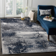 Moderní koberec DE LUXE 528 Abstrakce - Strukturální krém / tmavě modrá
