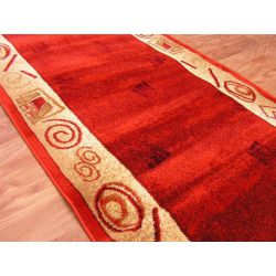 Alfombra de pasillo HEAT-SET ARGON tonos de naranja